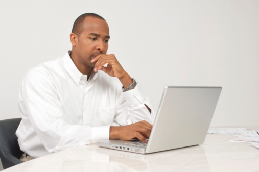 91459929_man studying chapter 13 bankruptcy.jpg