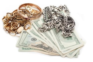jewelry and cash on table