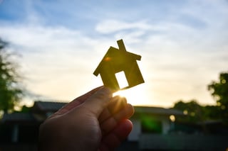 home_cutout_being_held_up_against_house