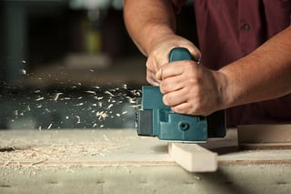 man using power tool