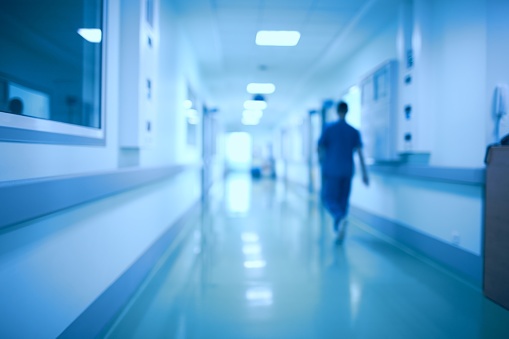 619636894_hospital corridor with nurse in background