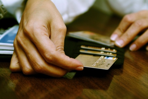person using credit cards