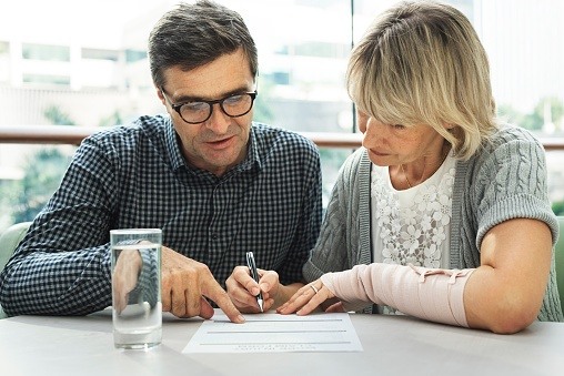 628418998_couple looking at paperwork