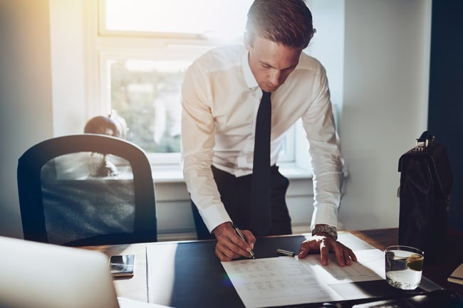 Businessman_at_a_desk