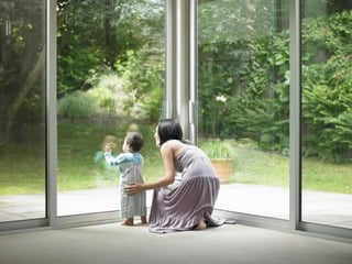 mother_and_son_looking_out_window