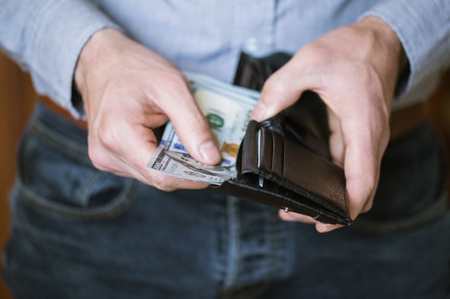 businessman-holding-money-in-his-hands