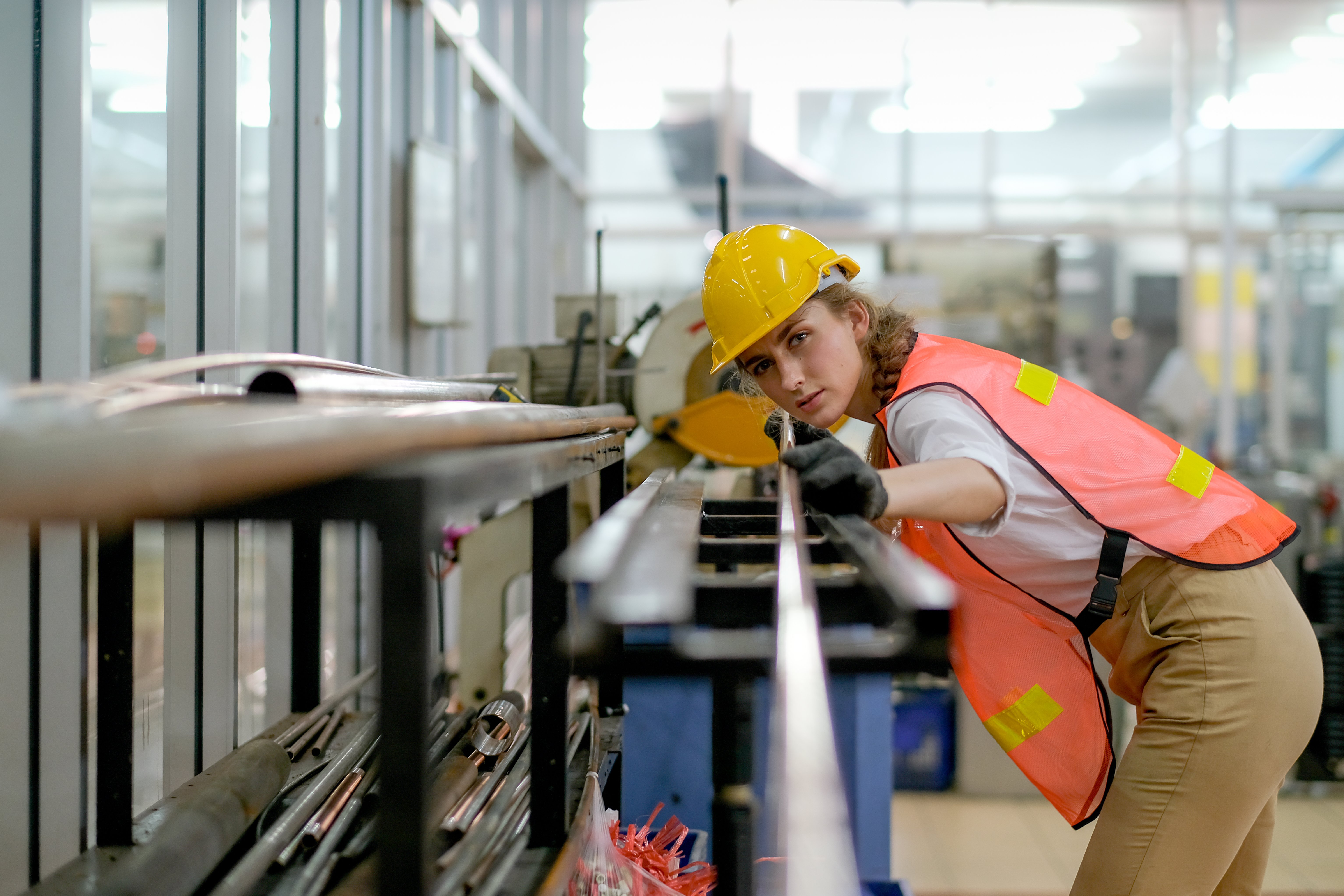 factory-technician-or-worker-woman-with-safety-uni-2021-12-09-17-11-14-utc