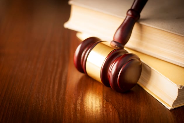 wooden-gavel-in-a-courtroom-2021-08-26-20-11-10-utc