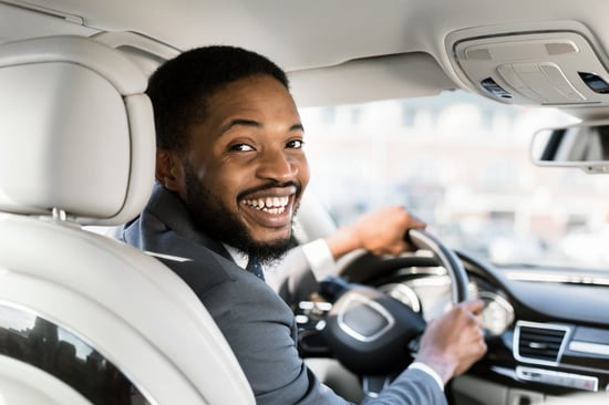 young-man-at-drivers-seat-uber