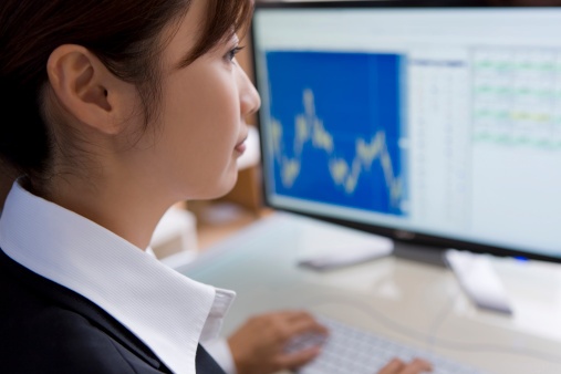 126435465_business woman looking at financials.jpg