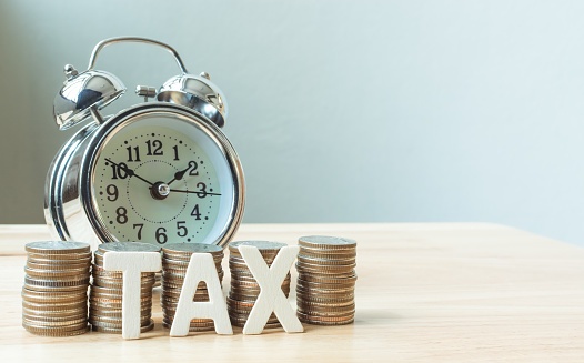 637301242_taxes and clock.jpg