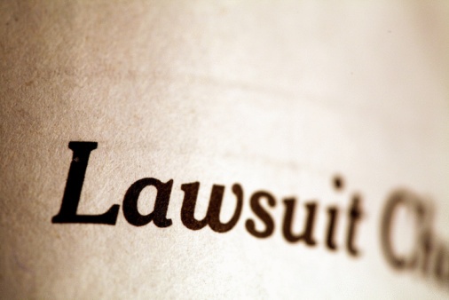 87717735_lawsuit_article_on_paper.jpg